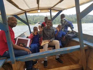 Study team travelling by boat to one of the study sites, Rusizi, Rwanda. Photo: PROFORMA