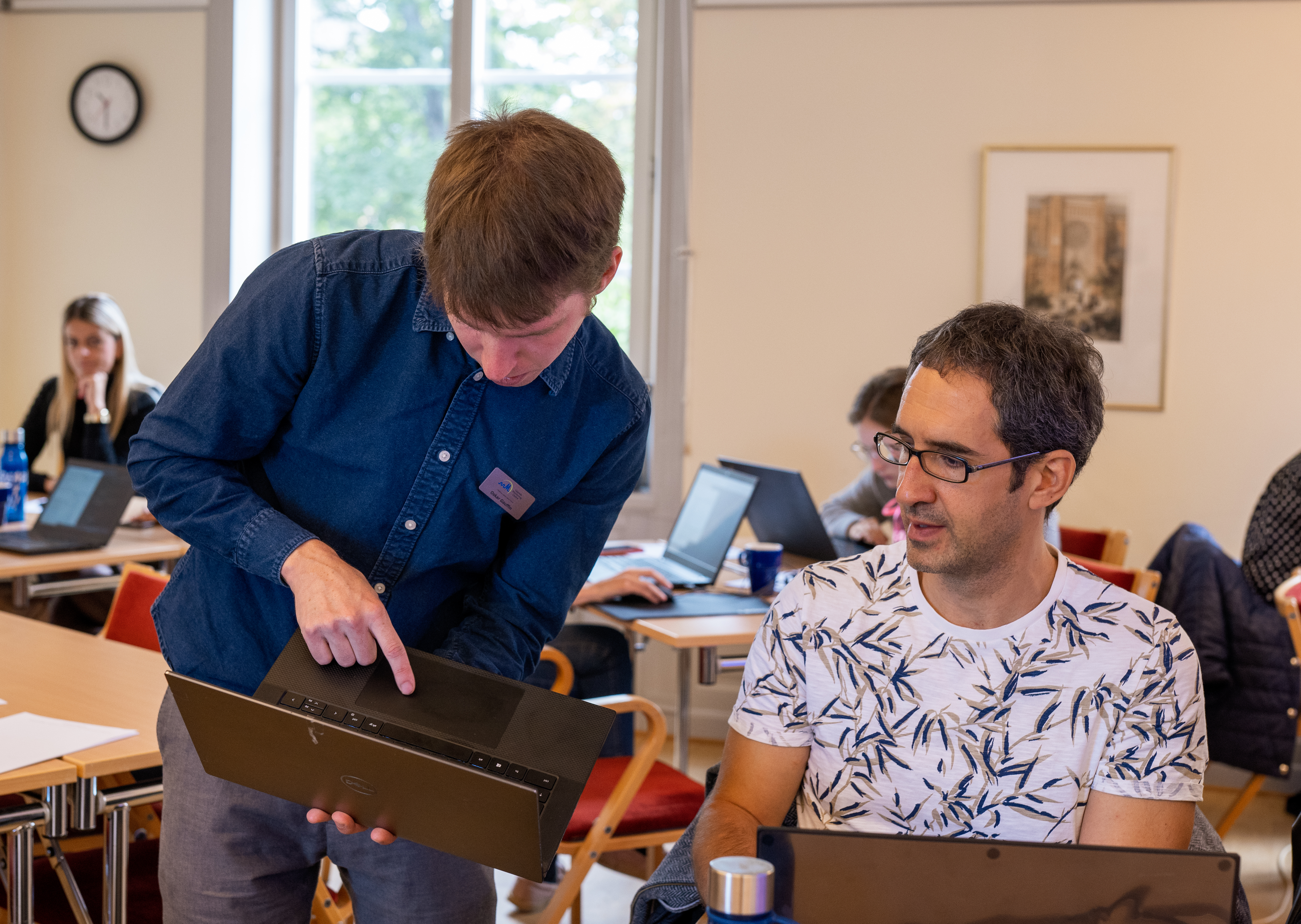 UMC data scientist Oskar Gauffin compares notes with Dr Juan Manuel Ramírez-Anguita of the Institut Municipal d’Assistència Sanitària Information System, managed by the Parc de Salut Mar Barcelona. Photo: Matthew Barwick/UMC